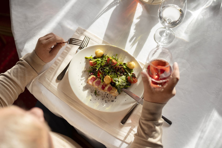 Bird's eye view of a person in front of a filled plate